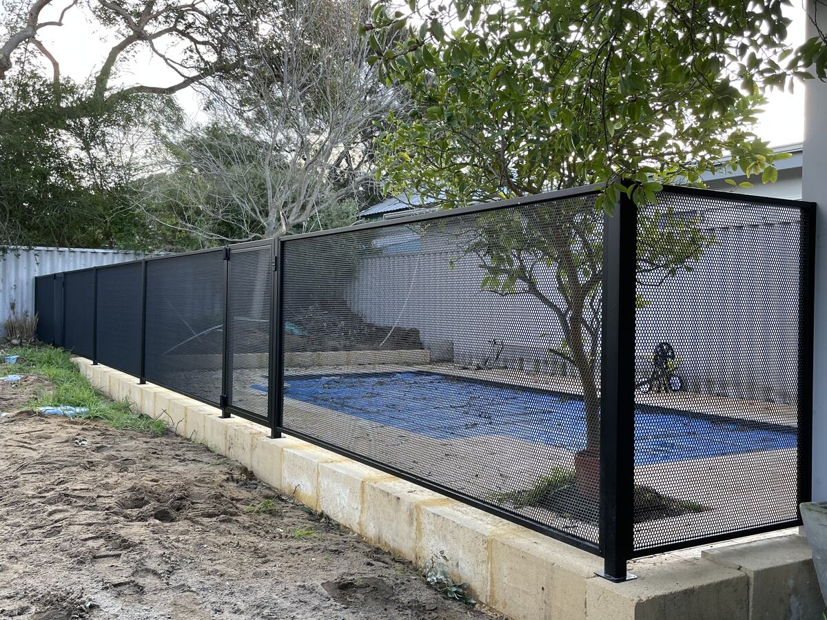 Pure Perf pool fence on a limestone retaining wall, Perth