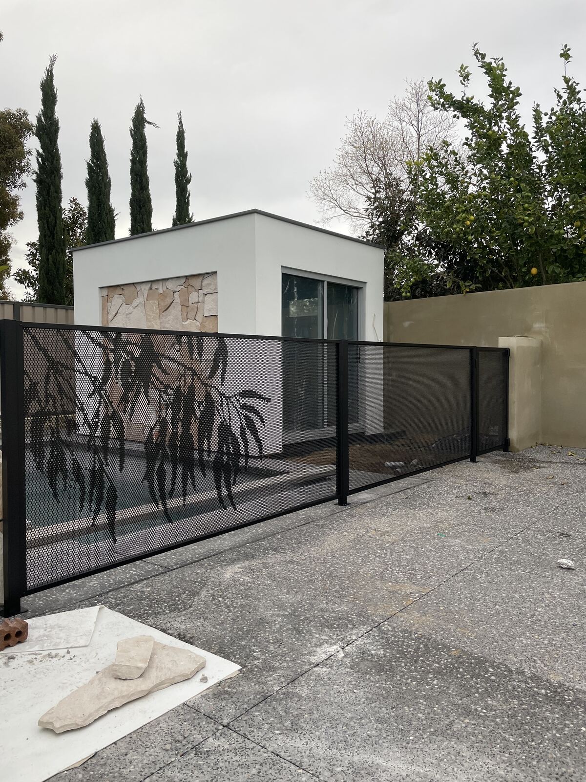 Gum Perf pattern pool fencing under an alfresco area in Perth